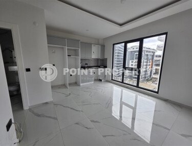 Солнечная квартира на центральной улице, 52 м², район Махмутлар-id-10612-фото-1