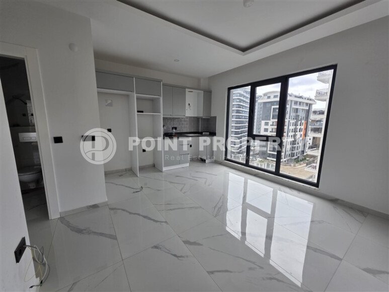 Солнечная квартира на центральной улице, 52 м², район Махмутлар-id-10612-фото-1