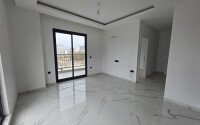 Солнечная квартира на центральной улице, 52 м², район Махмутлар-id-10612-фото-2