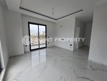 Солнечная квартира на центральной улице, 52 м², район Махмутлар-id-10612-фото-2