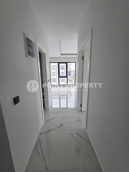 Солнечная квартира на центральной улице, 52 м², район Махмутлар-id-10612-фото-3