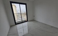 Солнечная квартира на центральной улице, 52 м², район Махмутлар-id-10612-фото-4