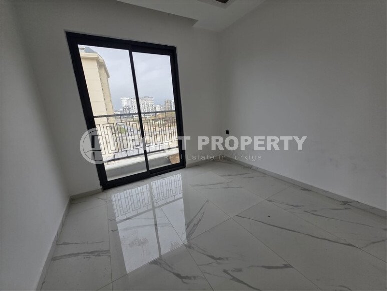 Солнечная квартира на центральной улице, 52 м², район Махмутлар-id-10612-фото-4