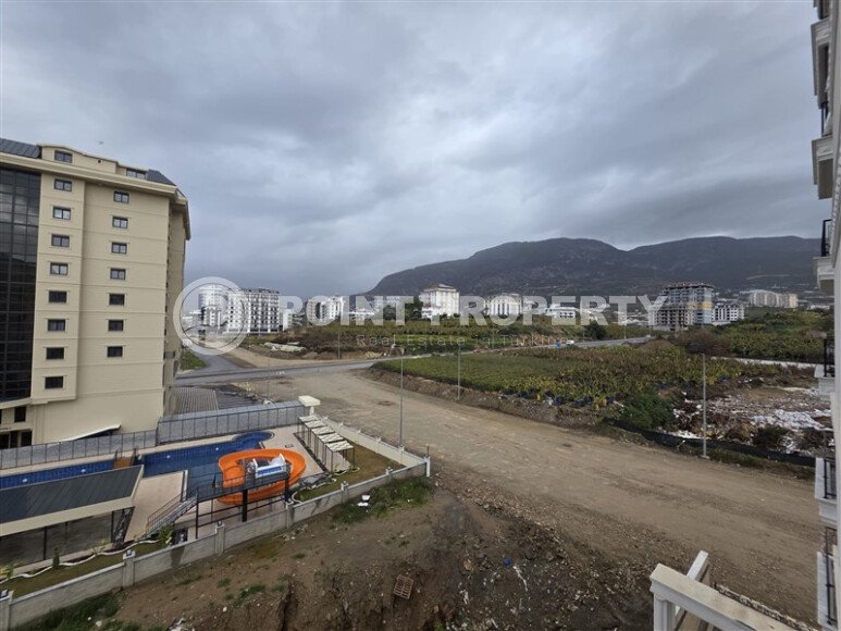 Солнечная квартира на центральной улице, 52 м², район Махмутлар-id-10612-фото-8