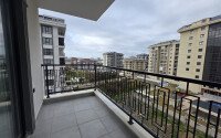 Солнечная квартира на центральной улице, 52 м², район Махмутлар-id-10612-фото-9