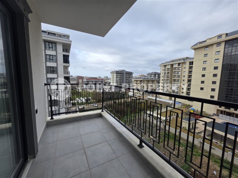 Солнечная квартира на центральной улице, 52 м², район Махмутлар-id-10612-фото-9