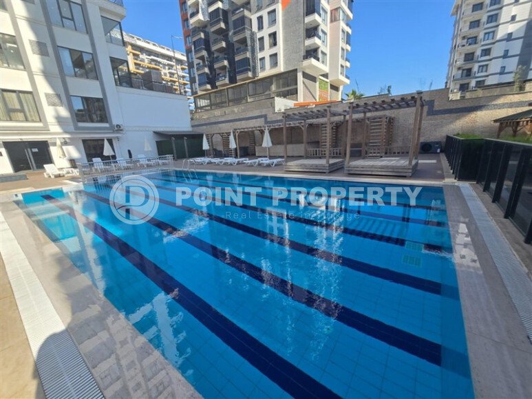 Солнечная квартира на центральной улице, 52 м², район Махмутлар-id-10612-фото-19