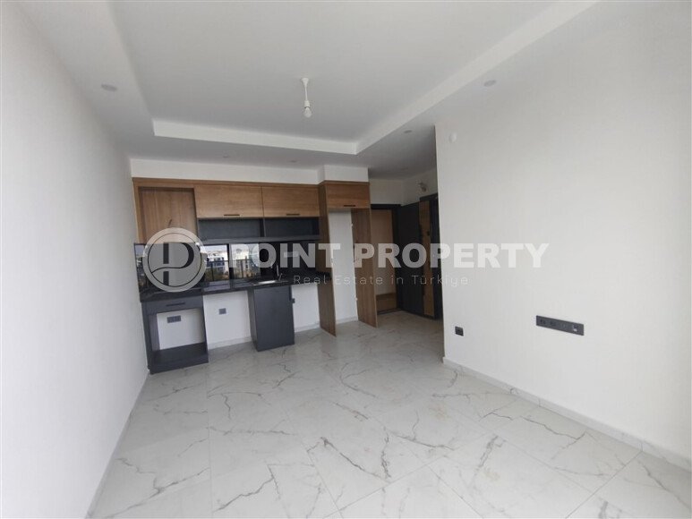 Доступная 50 м² с видом на море и трансфером, район Махмутлар-id-10628-photo-7