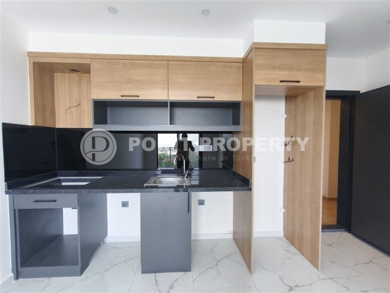 Доступная 50 м² с видом на море и трансфером, район Махмутлар-id-10628-photo-16