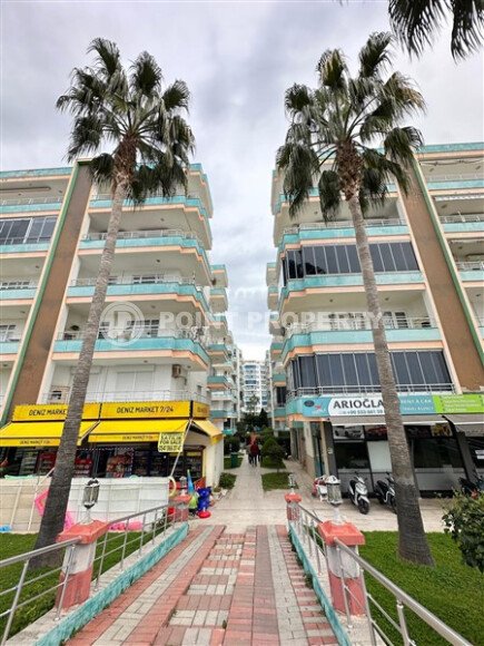 Уютная на первой береговой линии 95 м², район Махмутлар, частичный вид на море-id-10629-фото-6