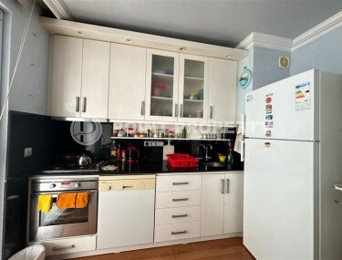 Уютная на первой береговой линии 95 м², район Махмутлар, частичный вид на море-id-10629-photo-4