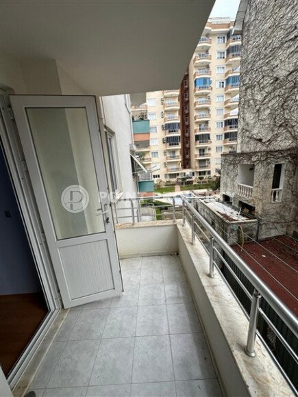 Уютная на первой береговой линии 95 м², район Махмутлар, частичный вид на море-id-10629-фото-19