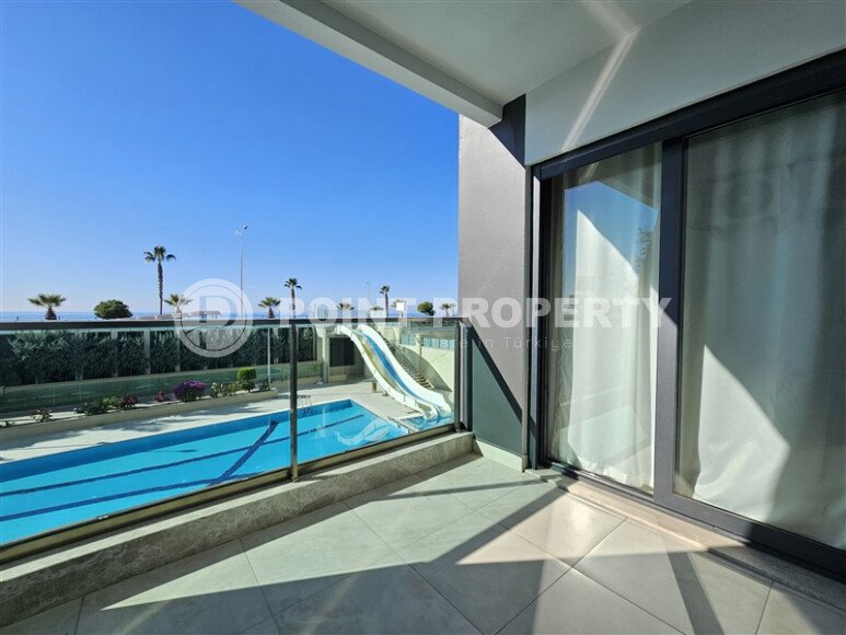 Bright apartment 60 m², Mahmutlar district, direct sea view-id-10640-photo-11