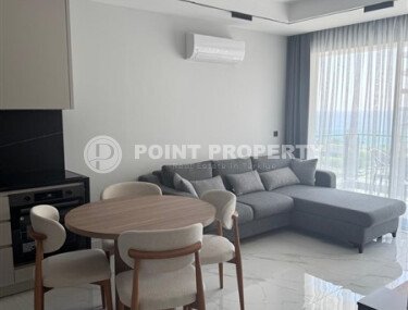 Spacious 63 m² apartment on the first line with sea views and its own underground passage to the beach, Mahmutlar district-id-10641-photo-2