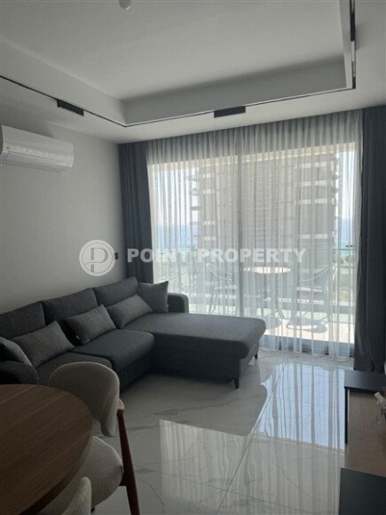 Spacious 63 m² apartment on the first line with sea views and its own underground passage to the beach, Mahmutlar district-id-10641-photo-3