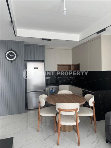 Spacious 63 m² apartment on the first line with sea views and its own underground passage to the beach, Mahmutlar district-id-10641-photo-4