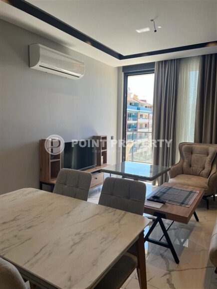 A laconic 56 m² apartment in the center of Alanya, a complex with infrastructure-id-10648-photo-3