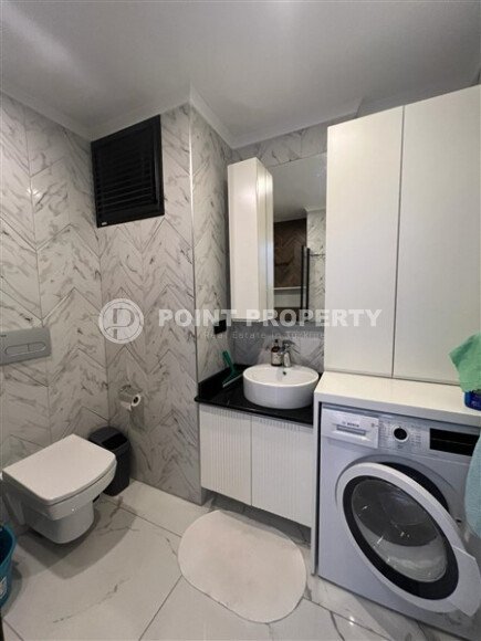 A laconic 56 m² apartment in the center of Alanya, a complex with infrastructure-id-10648-photo-7