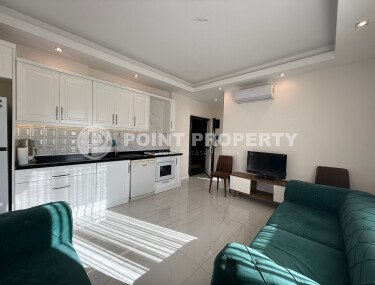 Modern apartment of 57 m² within walking distance of the sea, Mahmutlar-id-10349-photo-2