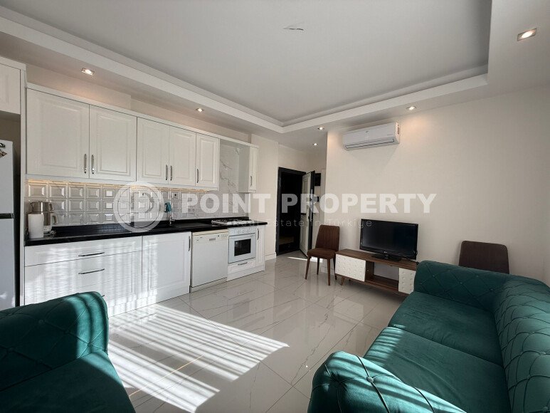 Modern apartment of 57 m² within walking distance of the sea, Mahmutlar-id-10349-photo-2