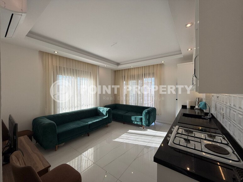 Modern apartment of 57 m² within walking distance of the sea, Mahmutlar-id-10349-photo-3