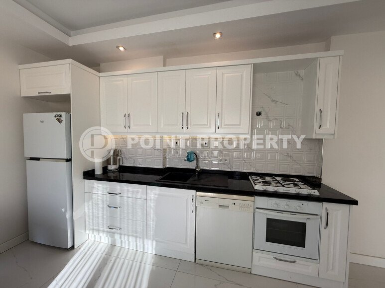 Modern apartment of 57 m² within walking distance of the sea, Mahmutlar-id-10349-photo-4