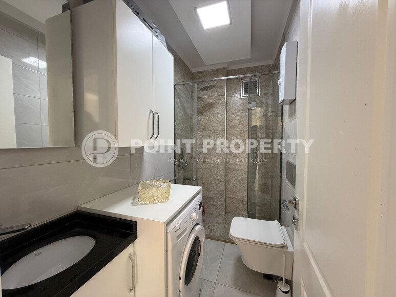 Modern apartment of 57 m² within walking distance of the sea, Mahmutlar-id-10349-photo-7