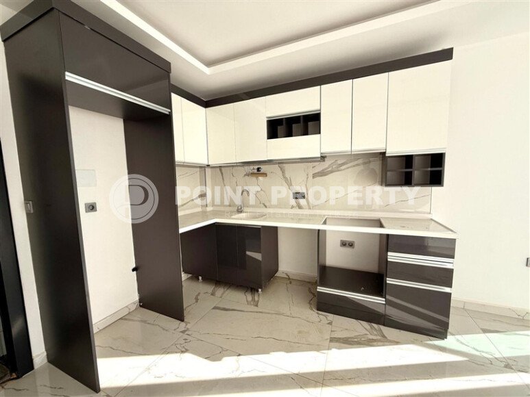 Светлая квартира 50 м², район Махмутлар по доступной цене-id-10655-фото-2