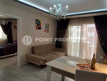 Comfortable 52 m² apartment in Mahmutlar district at an affordable priceA-id-10660-photo-2