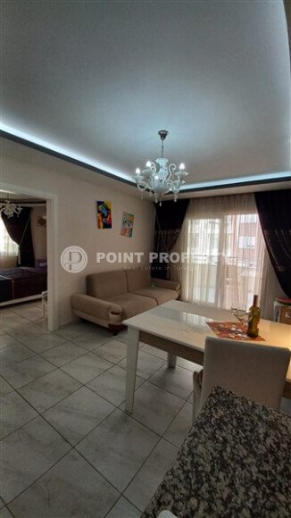 Comfortable 52 m² apartment in Mahmutlar district at an affordable priceA-id-10660-photo-2