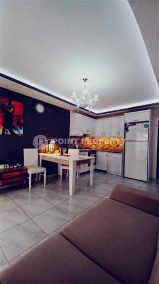 Comfortable 52 m² apartment in Mahmutlar district at an affordable priceA-id-10660-photo-3