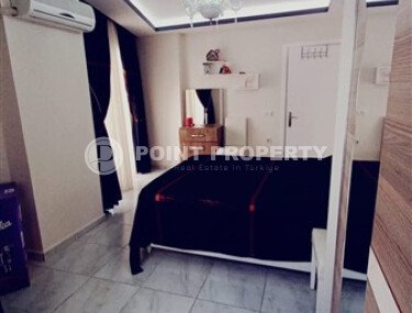 Comfortable 52 m² apartment in Mahmutlar district at an affordable priceA-id-10660-photo-4