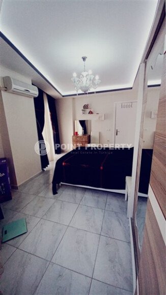 Comfortable 52 m² apartment in Mahmutlar district at an affordable priceA-id-10660-photo-4