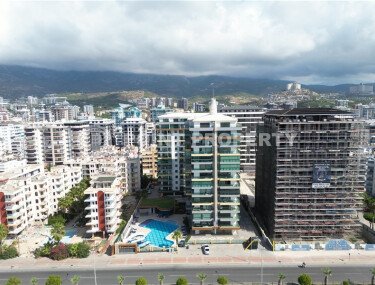 Современная квартира 85 м² район Махмутлар первая линия, вид на море-id-10685-фото-1