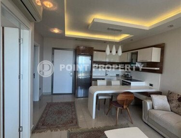 Панорамная квартира 60 м² на первой береговой линии в Махмутларе с видом на море и премиальной инфраструктурой-id-10689-фото-1