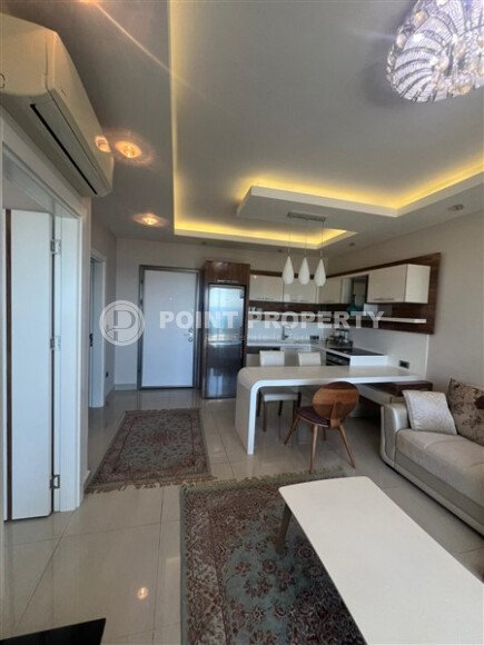 Панорамная квартира 60 м² на первой береговой линии в Махмутларе с видом на море и премиальной инфраструктурой-id-10689-фото-1