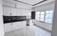 Светлый дуплекс 2+1 – 80 м² рядом с морем в Махмутлар-id-10699-фото-1