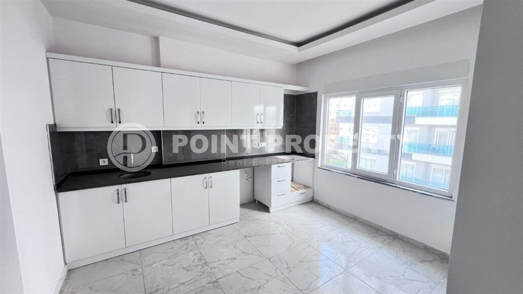 Светлый дуплекс 2+1 – 80 м² рядом с морем в Махмутлар-id-10699-фото-1