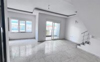 Светлый дуплекс 2+1 – 80 м² рядом с морем в Махмутлар-id-10699-фото-2