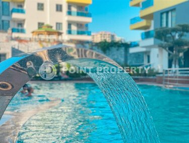 Солнечная квартира 1+1 – 55 м² в комплексе с богатой инфраструктурой, Махмутлар-id-10701-фото-1