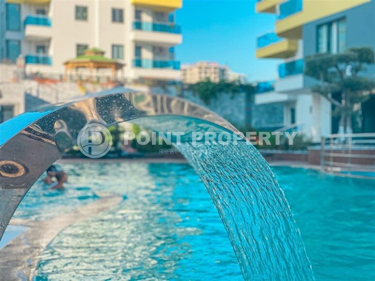 Солнечная квартира 1+1 – 55 м² в комплексе с богатой инфраструктурой, Махмутлар-id-10701-фото-1