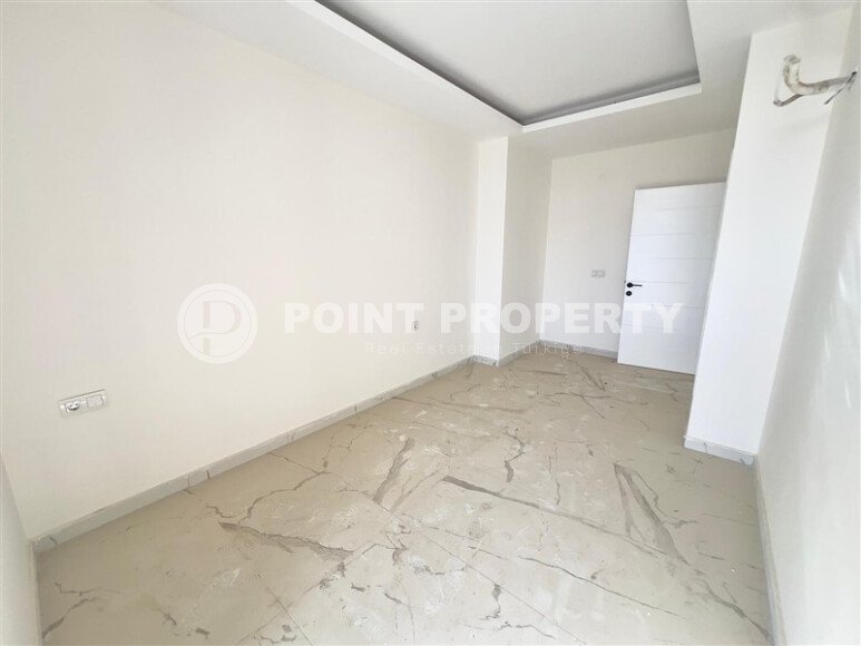 Солнечная квартира 1+1 – 55 м² в комплексе с богатой инфраструктурой, Махмутлар-id-10701-фото-4