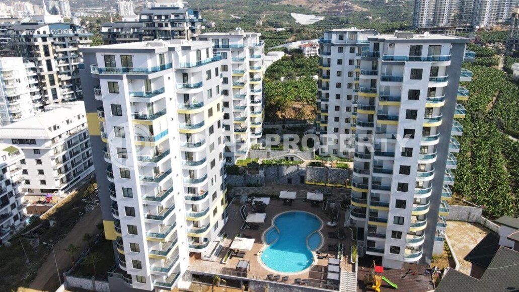 Солнечная квартира 1+1 – 55 м² в комплексе с богатой инфраструктурой, Махмутлар-id-10701-фото-14