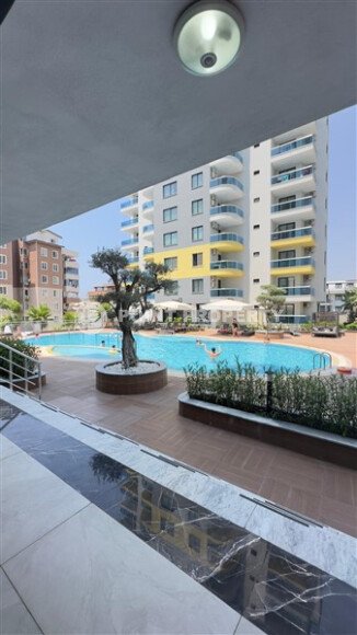 Солнечная квартира 1+1 – 55 м² в комплексе с богатой инфраструктурой, Махмутлар-id-10701-фото-16