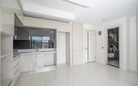 Элитные апартаменты 1+1 – 58 м² в комплексе с отелем и возможностью краткосрочной аренды, Тюрклер-id-10703-фото-2