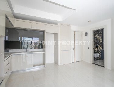 Элитные апартаменты 1+1 – 58 м² в комплексе с отелем и возможностью краткосрочной аренды, Тюрклер-id-10703-фото-2