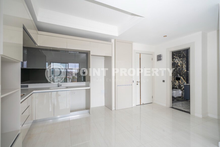 Элитные апартаменты 1+1 – 58 м² в комплексе с отелем и возможностью краткосрочной аренды, Тюрклер-id-10703-фото-2