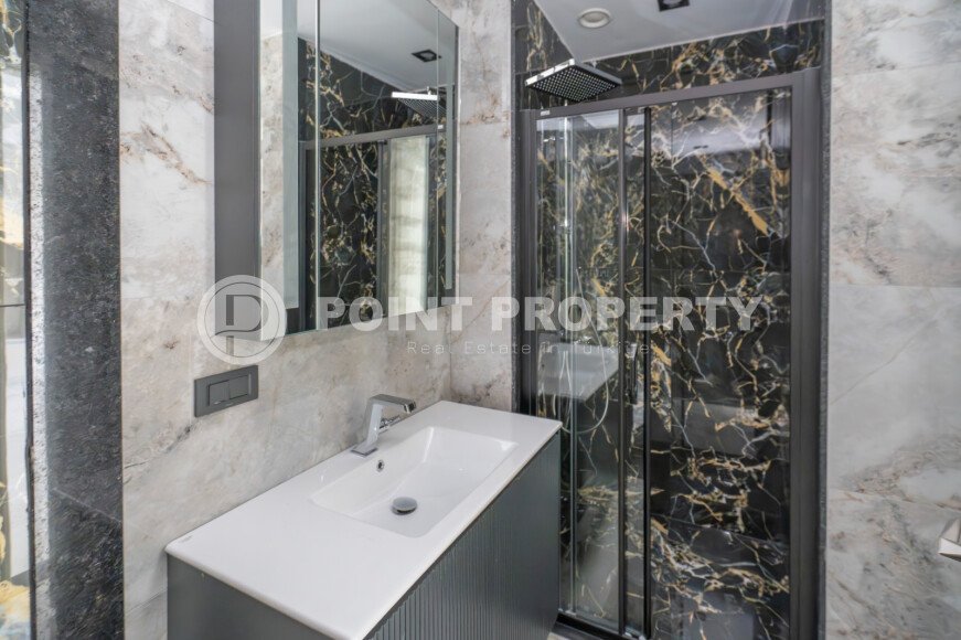 Элитные апартаменты 1+1 – 58 м² в комплексе с отелем и возможностью краткосрочной аренды, Тюрклер-id-10703-фото-9