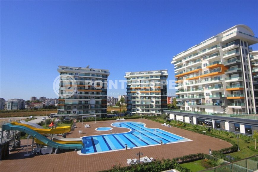 Светлая квартира 1+1 – 65 м² в жилом комплексе с развитой инфраструктурой, район Авсаллар-id-10726-фото-1