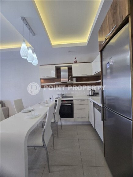 Вместительная квартира 1+1 – 70 м² с панорамным балконом, район Махмутлар-id-10732-фото-3